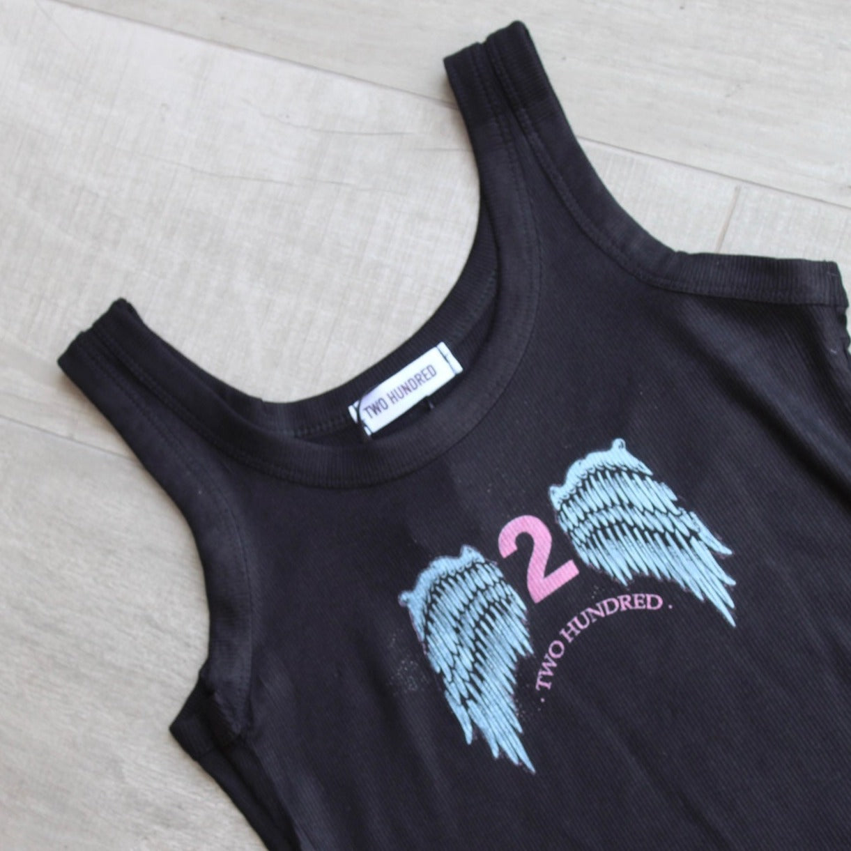 Polera sin mangas alas